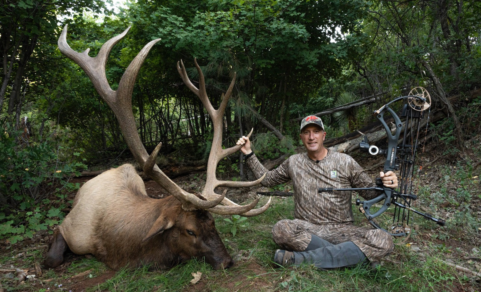 Greg Glesinger with Huntworx TV with a massive bull elk he shot using Jr's IMX Style Suppressor